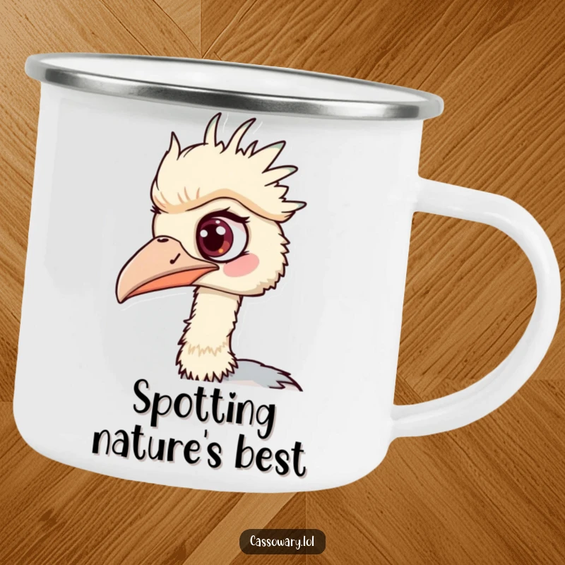 Funny Cassowary Camping Mug: A rugged mug with a cassowary's one eye wide, humorously spotting campfire treats or scenic views.
