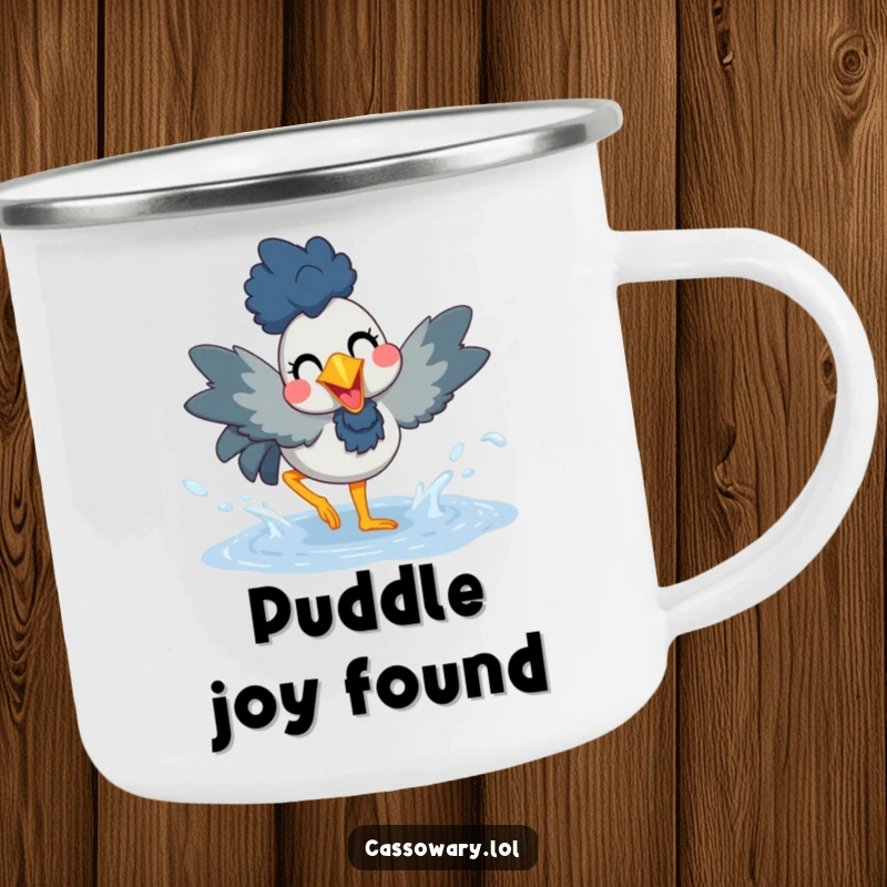 Funny camping mug featuring a cassowary joyfully splashing in a puddle, ideal for hot drinks and outdoor adventures.