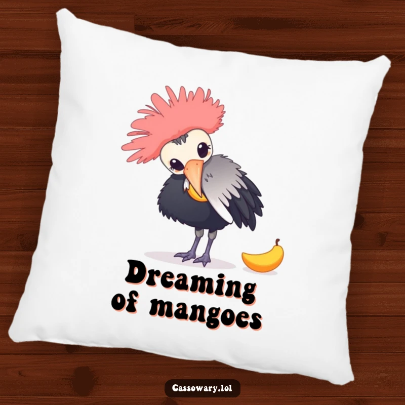 Funny pillow showcasing a cassowary playfully nudging a fallen mango, adding a humorous touch to living spaces.