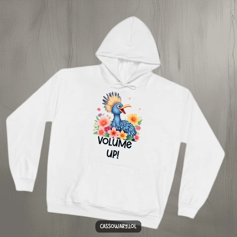 Funny hoodie depicting a cassowary joyfully squawking amongst vibrant flowers, offering warmth and cheerful vibes.
