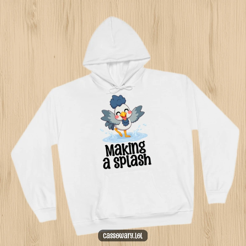 Funny hoodie with a cassowary joyfully splashing in a puddle, offering comfort and a cheerful, playful vibe.