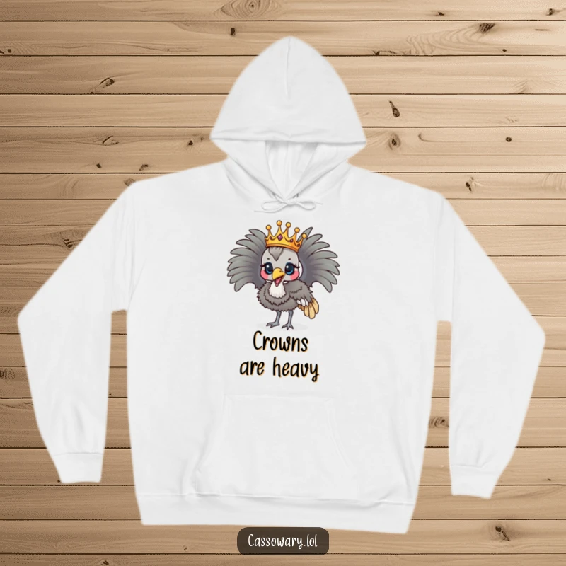 Funny cassowary wearing a crown, parading majestically, cozy and humorous hoodie.