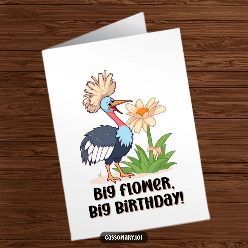 Funny Free Printable Birthday Card: A cassowary looks with great enthusiasm at a comically large, vibrant flower.