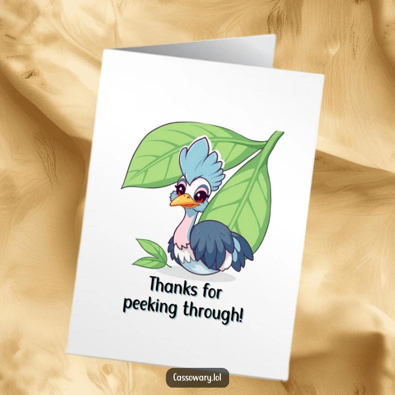 Funny Free Printable Thank You Card: Cheerful cassowary peeking from behind a large leaf, offering thanks.