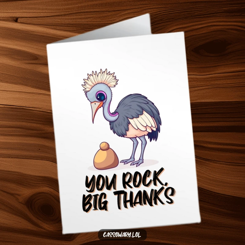 Funny free printable thank you card: A cassowary focuses intensely while attempting to balance a small, colorful pebble.