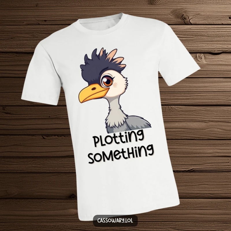 Funny cassowary t-shirt depicting a bird with a mischievous gleam in its eye, embodying playful intent and humorous charm.