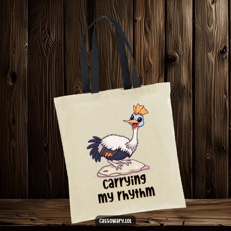 Funny Cassowary Tote Bag showing a bird joyfully tapping its beak on a stone, perfect for carrying happiness.